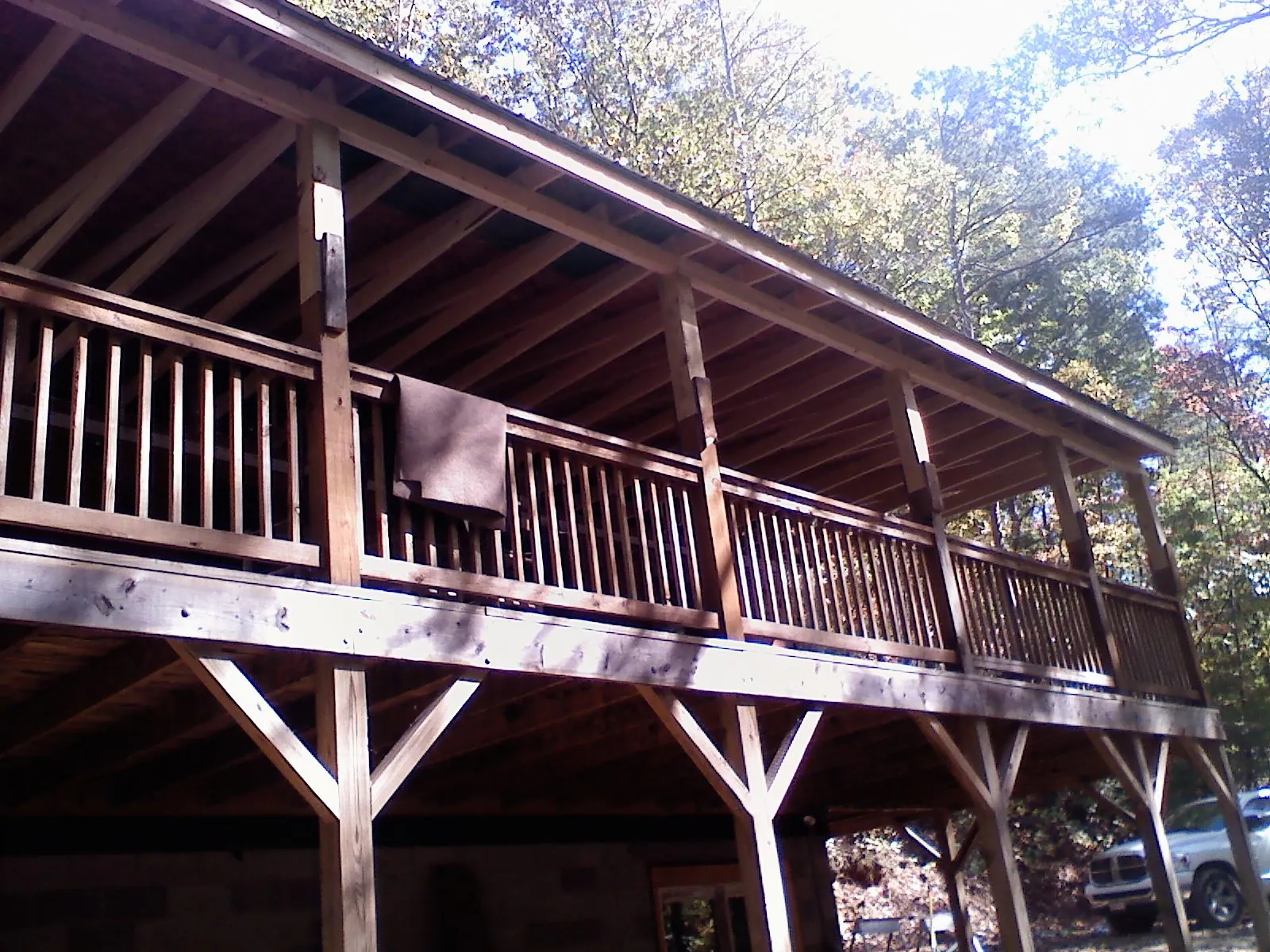 Timber framing under a new elevated porch and deck — Roof Leak Repair in West Rutland by Roofing Brothers
